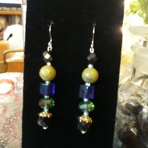 Earrings with gems and stones from the Pacific Nor